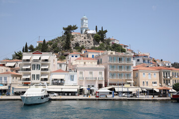 Beautiful view of coastal city and yacht on sunny day