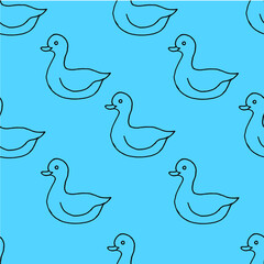 Fototapeta premium Beautiful background of toy ducks drawn with black marker on blue paper. Seamless ducks pattern. Print for bed linen.