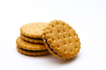 Round cookies with chocolate filling on a white background. Shallow depth of field