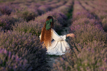 girl in lavender field long hair bow decoration