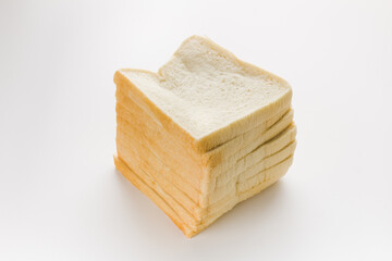 Loaf of sliced white bread isolated on white background