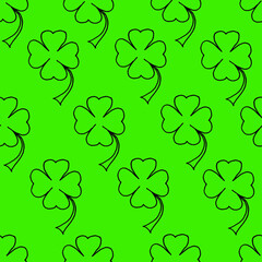Beautiful background of clover drawn with a black marker on green paper. Seamless nature pattern. Print for bed linen. Saint Patrick's day concept. St. Patrick's background. 