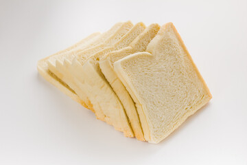 Loaf of sliced white bread isolated on white background