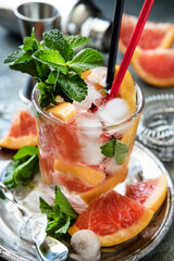 Summer cocktail with   mint in glass, selective focus