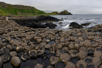 landscape view of the many volcanic basalt columns of the Giant's Causeway in Northern Ireland
