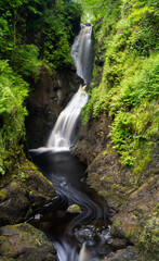 view of the picutresque Glenariff Waterfall in Northern Ireland
