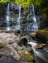 Fototapeta premium view of the Ess-Na-Crub Waterfall in the Glenariff Nature Reserve