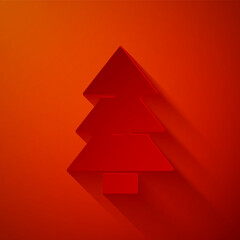 Paper cut Christmas tree icon isolated on red background. Merry Christmas and Happy New Year. Paper art style. Vector