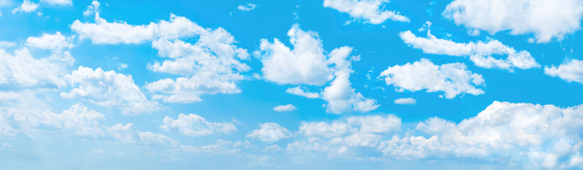 Panoramic background of blue sky with white clouds