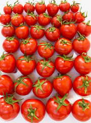 tomato scattered on a white background.  product packaging design of tomato juice, pasta, croutons, chips.  phone screensaver, website design.