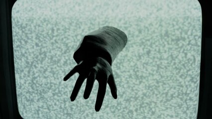 creepy hand coming out of TV