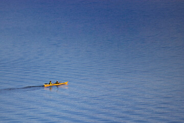 yellow kayak on the lake minimalism