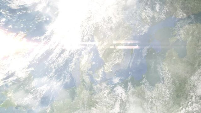 Earth zoom in from outer space to city. Zooming on Varberg, Sweden. The animation continues by zoom out through clouds and atmosphere into space. Images from NASA