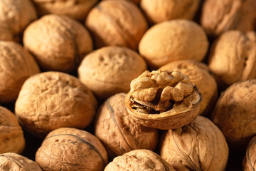 Ripe walnuts on the market close-up. Fresh harvest of nuts. Healthy food concept