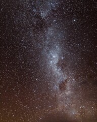 Fototapeta Vertical shot of a beautiful sky full of bright stars obraz