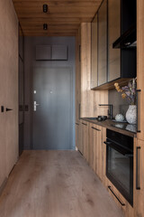 Fototapeta na wymiar Small kitchen in corridor