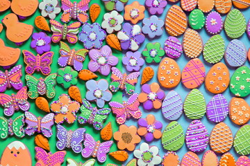 Fototapeta na wymiar Easter Homemade Gingerbreads. Funny Flowers, Butterflies and Eggs Cookies. Table Top