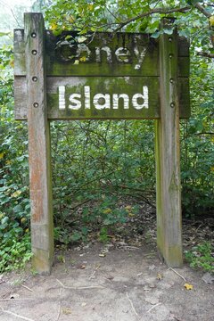 A Photo Of A Wooden Sign Reading Coney Island