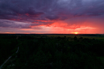 red sunset in storm clouds