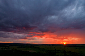 red sunset in storm clouds