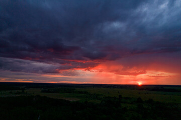 Obraz na płótnie Canvas red sunset in storm clouds