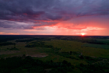 Fototapeta premium red sunset in storm clouds