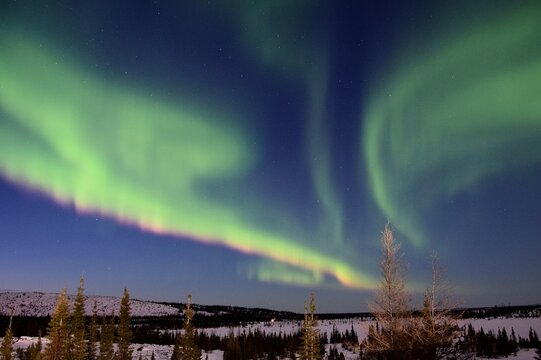 Bright And Colorful (green, Pink And Purple) Canadian Northern Lights Dancing Over A Mining Drill In The Frozen Taiga Of James Bay (Canada)