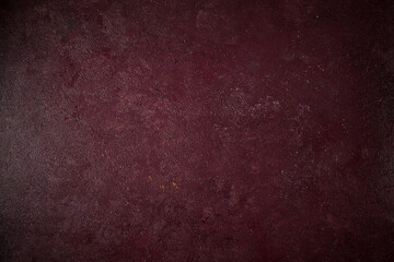 Maroon background, non-uniform, textured, shiny, top view, horizontal,