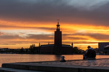 Silhouette of the Stockholm City Hall during sunset in Stockholm, Sweden