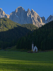 Traditional alpine St Johann church in Val di Funes valley, Santa Maddalena. Dolomites, Italy, Europe