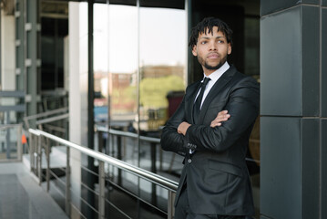 Fototapeta premium african businessman in suit at street