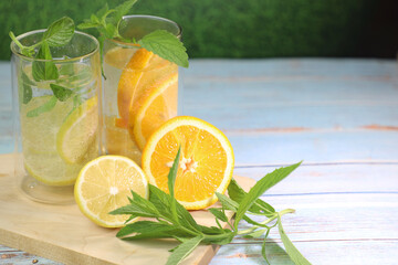 refreshing lemonade made from lemon, orange and mint