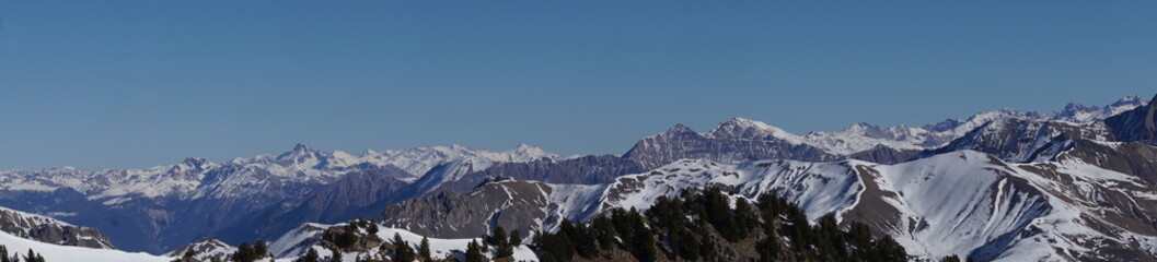panoramic view of the mountains of the alps from a ski resort