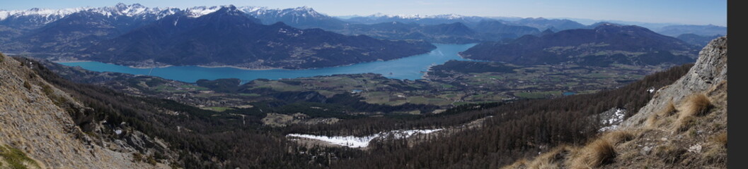 panoramic view of the mountains around serre ponçon lake alps france from réallon