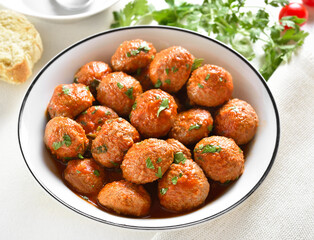 Meatballs with tomato sauce in bowl