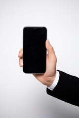 black smartphone in men's hands close-up. smartphone template for your design