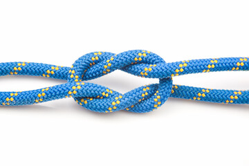 durable colored rope for climbing equipment on a white background. knot of braided cable. item for...