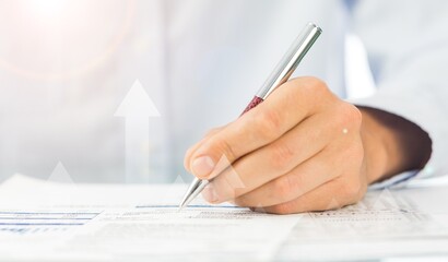 Hand using writing pen filling in business company personal information form checklist document.