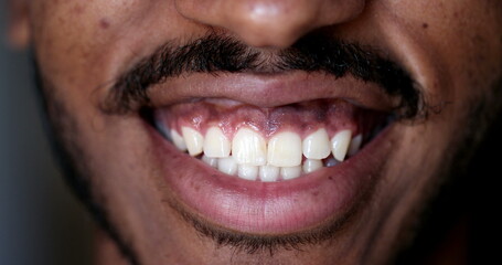 African male close-up face, lips smiling