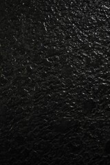 A black asphalt texture. asphalt road. stone asphalt texture background black granite gravel