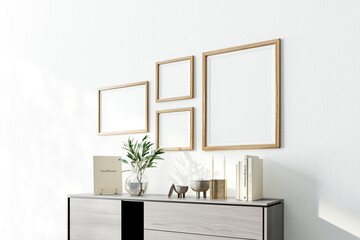 Poster arts mockup with wooden frames on white wall, view 2, green plant. 3d rendering, illustration