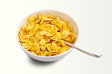 Corn flakes with milk in bowl on the desk