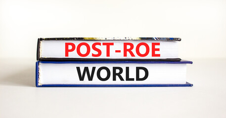 Roe vs Wade post-Roe world symbol. Concept words Post-Roe world on books on a beautiful white table...