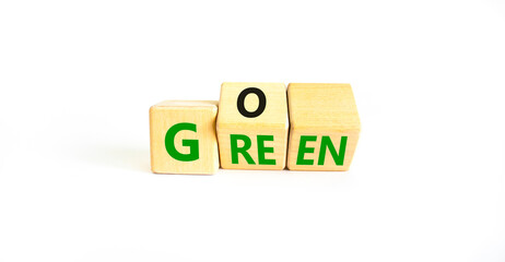 Ecology and go green symbol. Concept words Go green on wooden cubes. Beautiful white table white background. Business ecological and go green concept. Copy space.