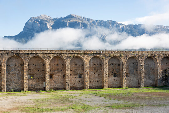 arcades of the castle wall with a view to the mountain at A&iacute;nsa (A&iacute;nsa-Sobrarbe), Sobrarbe, province of Huesca, Aragon, Spain