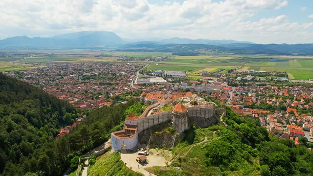 Aerial drone view of The Rasnov Fortress in Romania. Medieval fortress and town, Carpathians