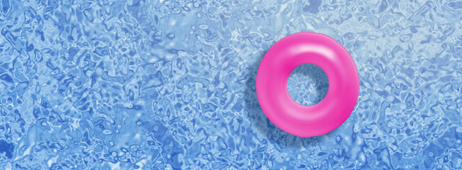 pink floating ring in a beautiful swimming pool - vacation concept