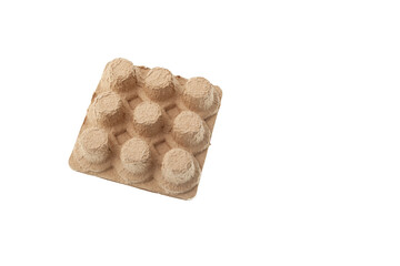 Paper box for coffee capsules on white background. Eco-friendly packaging made of recycled waste paper. Modern trend. Reuse of packaging