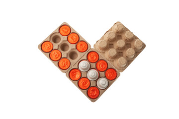 Coffee capsules in folding paper box. Eco-friendly packaging made of recycled waste paper for coffee capsules. Modern trend. Reuse of packaging