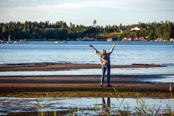 Fototapeta na wymiar person on the beach, norrland, sverige,sweden
